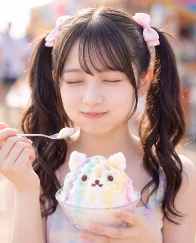 Rino eating a cat-shaped shaved ice dessert